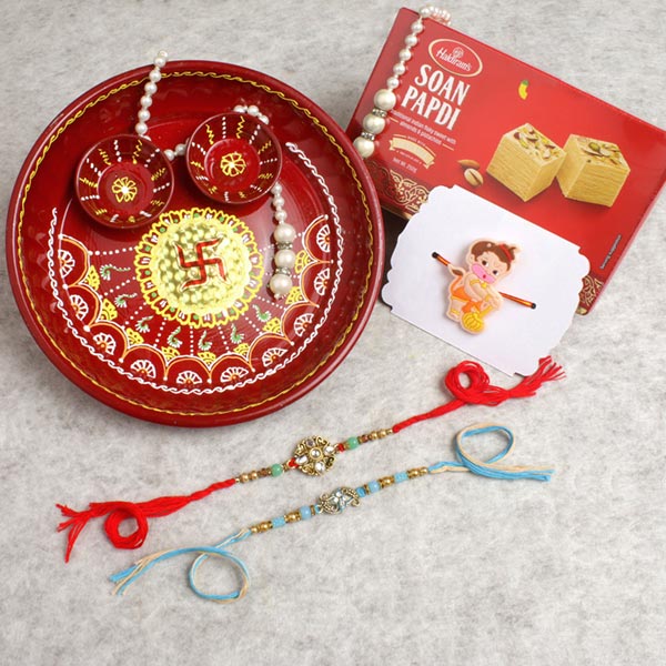 Three Family Rakhi Set With Puja Thali Sweet Hamper For UK