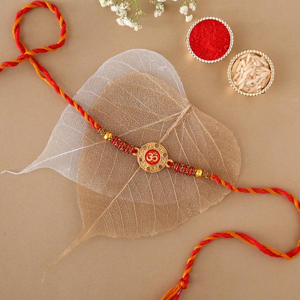 Sneh Traditional Om Rakhi to Dubai