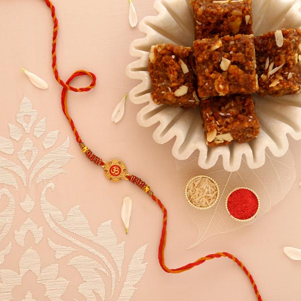 Sneh Traditional Om Rakhi with Dodha Burfi