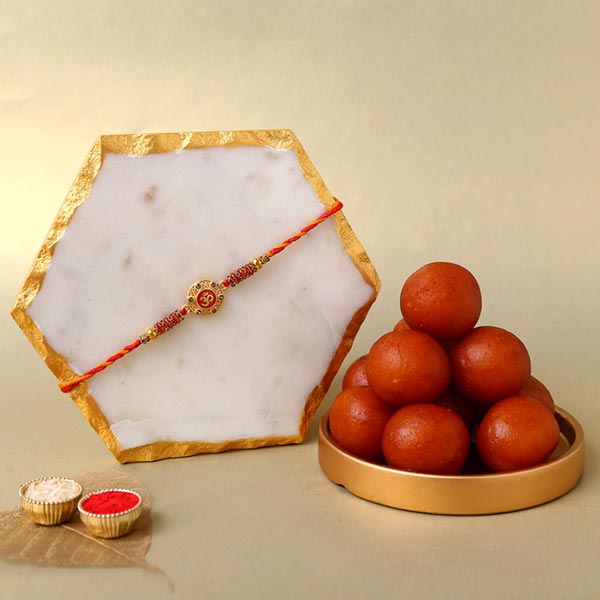 Sneh Traditional Om Rakhi with 1 Kg Gulab Jamun Tin
