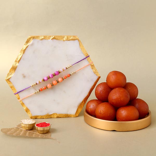 Sneh Peachy Rakhi Set with 1 Kg Gulab Jamun
