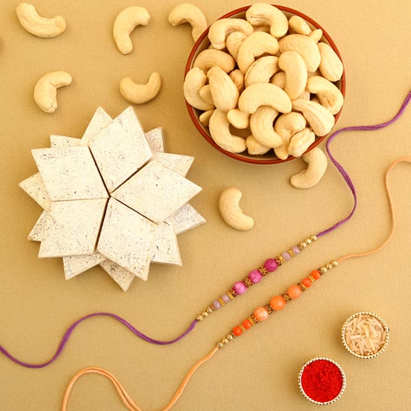 Sneh Peachy Rakhi Set with 250 Grams Kaju Katli and Cashew