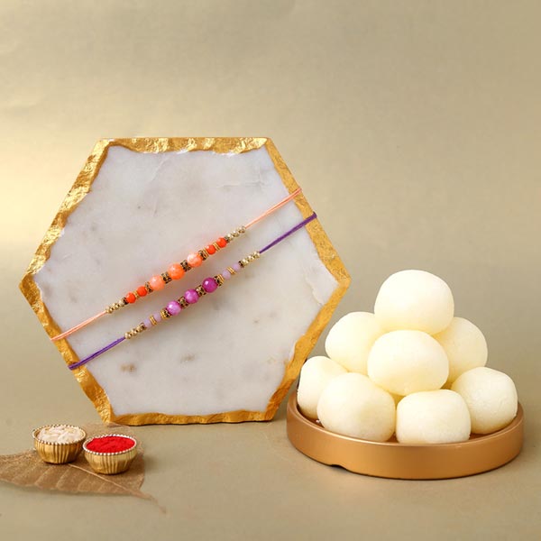 Sneh Peachy Rakhi Set with 1 Kg Rasgulla Tin