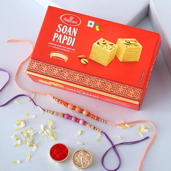 Sneh Peachy Rakhi Set with 500 Grams Soan Papdi