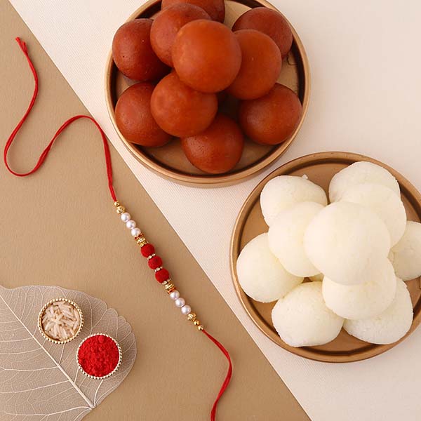 White Pearl And Velvet Beads Rakhi with 1 Kg Gulab Jamun and Rasgulla Tin