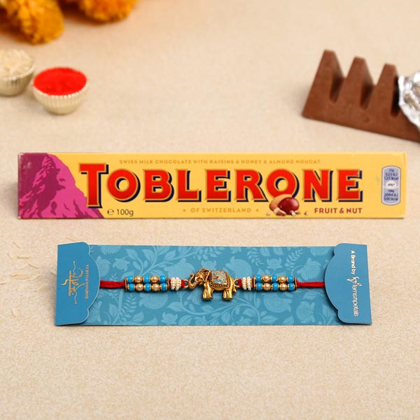 Meenakari Elephant Pearl Rakhi And Toblerone Chocolate