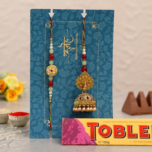 Dancing Peacock Jhumki Lumba Rakhi Set With Toblerone Chocolate