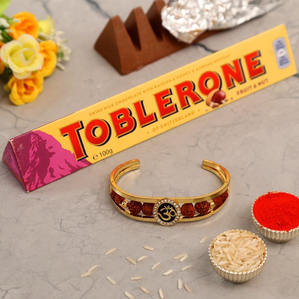 Om And Rudraksha Bracelet Rakhi With Toblerone Chocolate