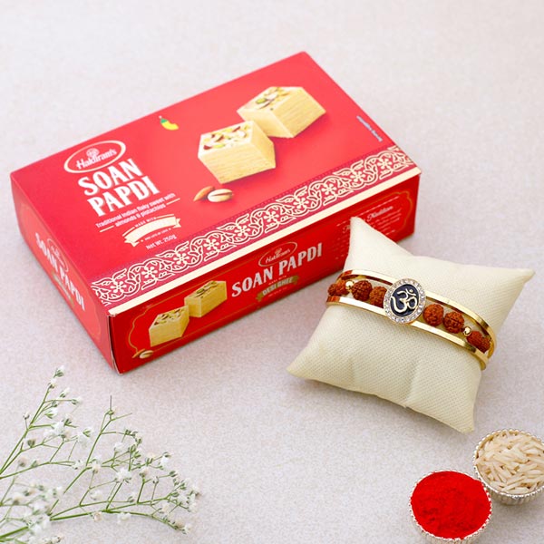 Om And Rudraksha Bracelet Rakhi With Soan Papdi