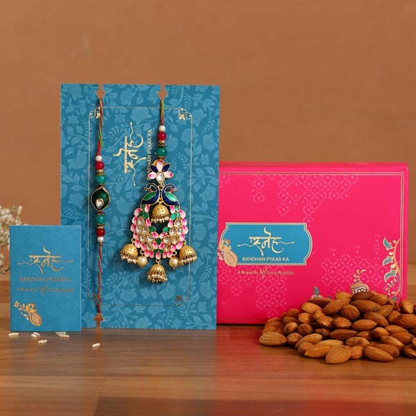 Pink Peacock Lumba Rakhi Set With Healthy Almonds