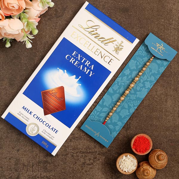 Traditional Pearl Mauli Rakhi And Lindt