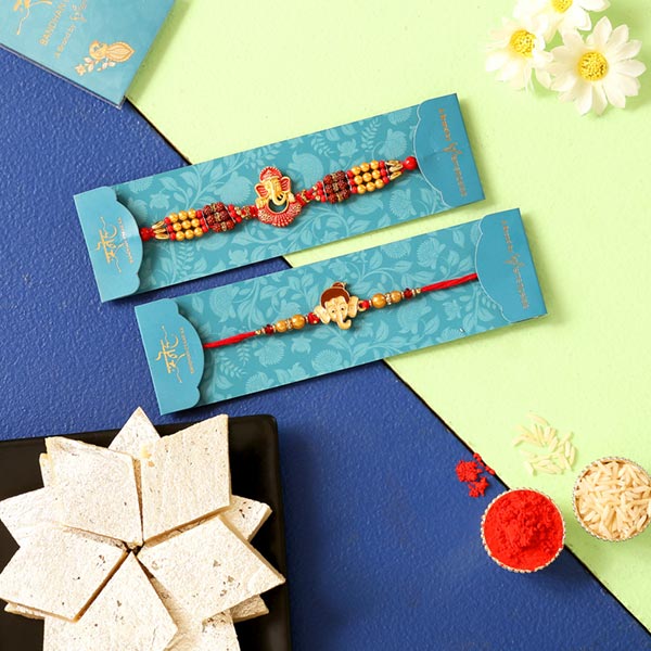 2 Lord Ganesha Rakhis & Kaju Katli Combo