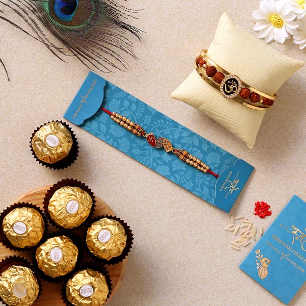 Om Bracelet & Red Peacock Rakhis With Ferrero Rocher