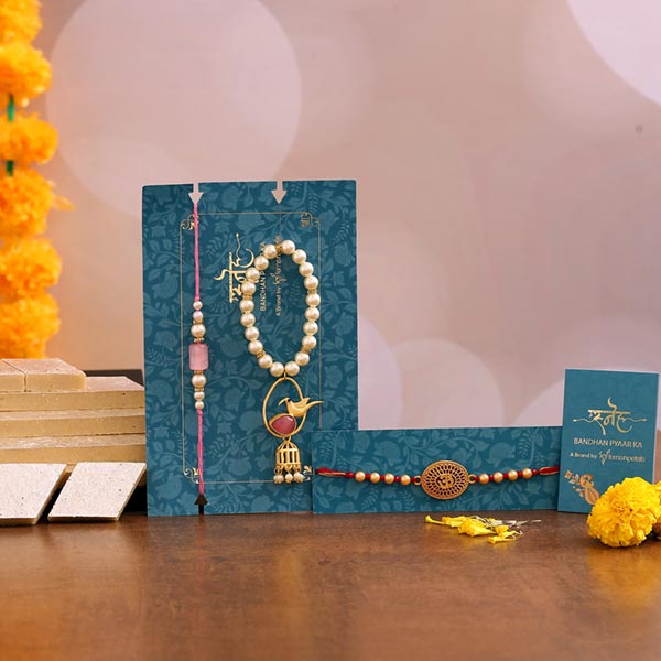 Caged Bird Lumba Rakhi Set & Om Rakhi With Kaju Katli
