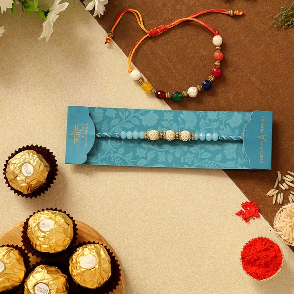 Set Of 2 Ethnic Pearl Rakhis & Ferrero Rocher Combo
