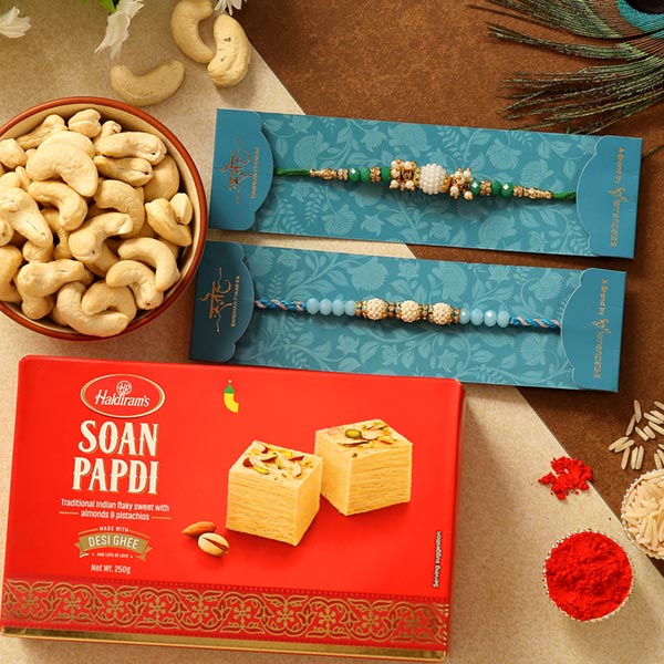 Set Of 2 Pearl Designer Rakhis & Soan Papdi Hamper