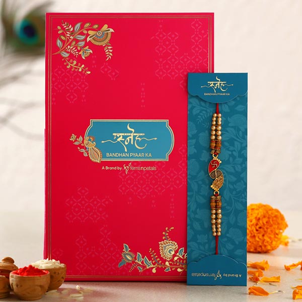 Divine Swastik Paduka Pearl Rakhi - Dubai