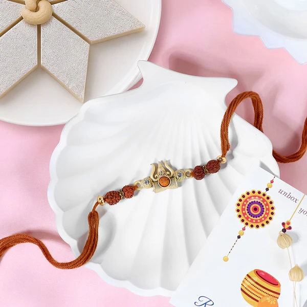 Sacred Trishul Rakhi with Kaju Katli Sweet
