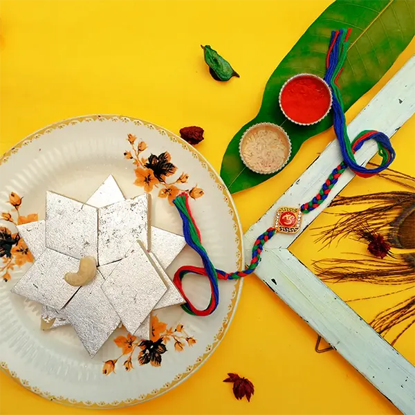 Multicolor Om Rakhi with Kaju Katli