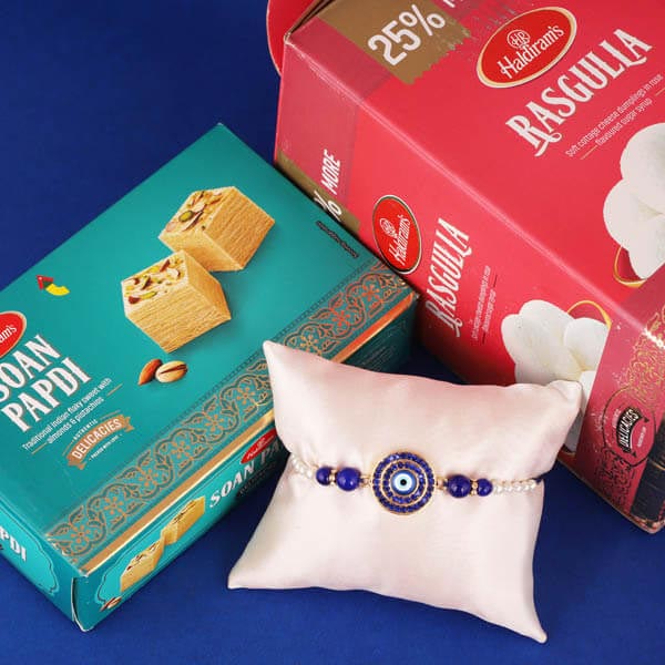 Royal Blue Rakhi & Rasgulla, Soan