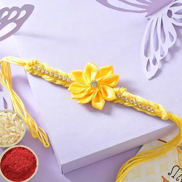 Sunny Blossom Rakhi with 100gm Almond for USA Brother