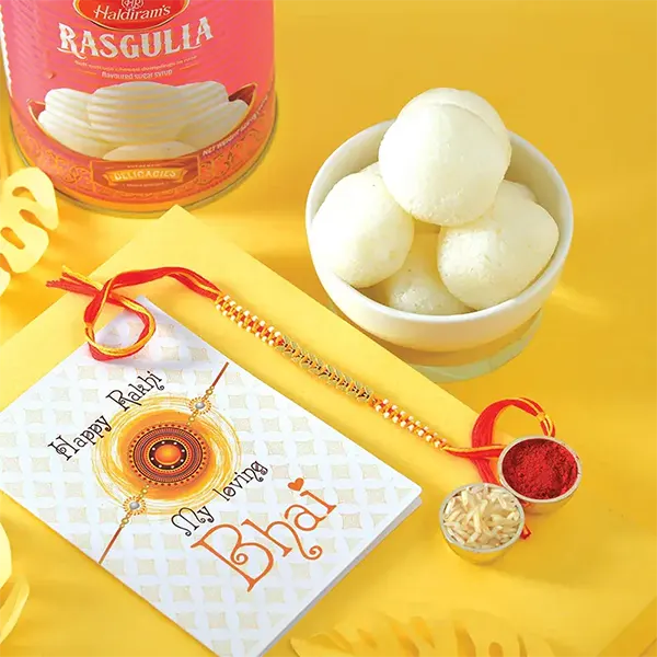 1kg White Rasgulla with Rakhi Symphony for USA