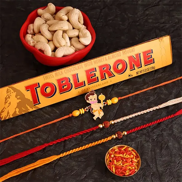 Sunshine Sweetness Rakhi with 99gm Toblerone and 100gm Cashew for USA Bro