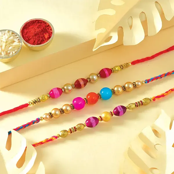 Triplet Design Rakhi with 340gm Dhodha Barfi