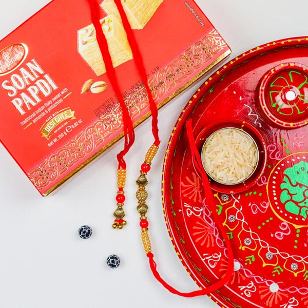 Bhaiya Bhabhi Set Of 2 Rakhis With Soan Papdi & Ganesha Thali