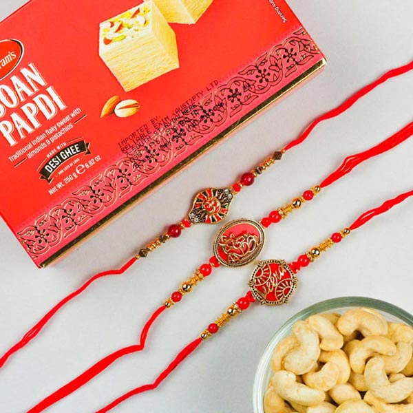 Veera, Om & Ganesha Set Of 3 Rakhis With Soan Papdi & Dryfruits