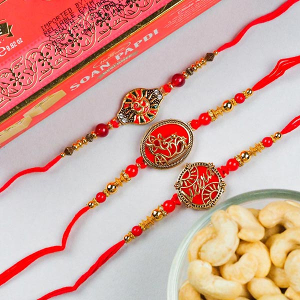 Veera, Om & Ganesha Set Of 3 Rakhis With Soan Papdi & Dryfruits