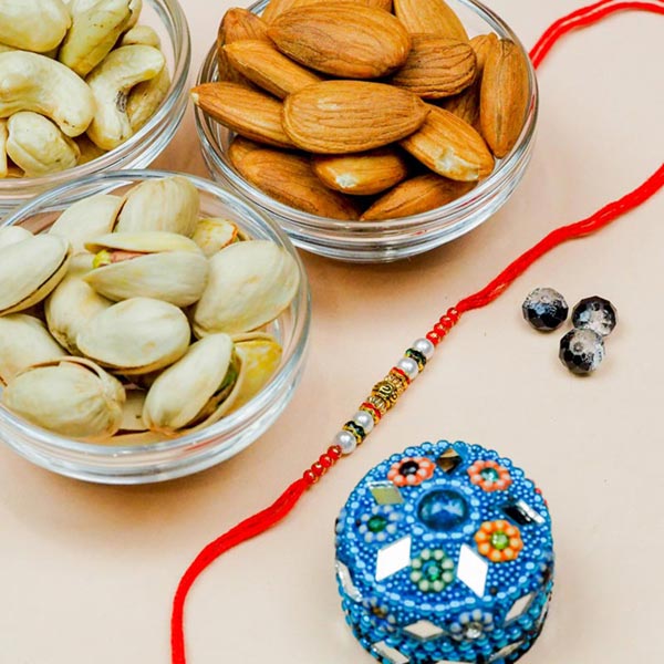 Pearl Rakhi With Mix Dryfruits