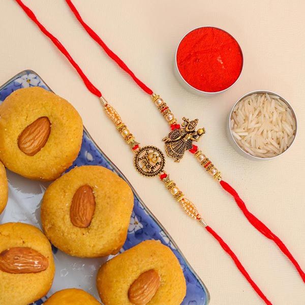 Trishul & Radha Krishna Set of 2 Rakhis With Besan Laddoo