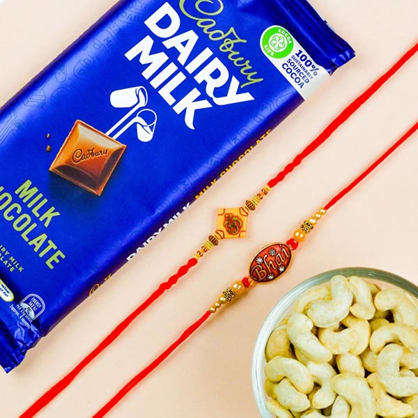 Om & Bhai Set of 2 Rakhis With Dairy Milk & Cashews