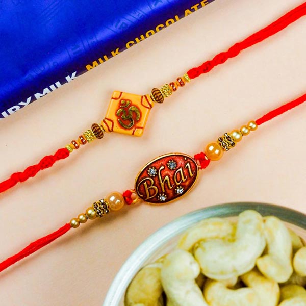 Om & Bhai Set of 2 Rakhis With Dairy Milk & Cashews